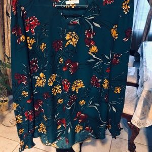 Nice green flowery blouse with multiple colors.